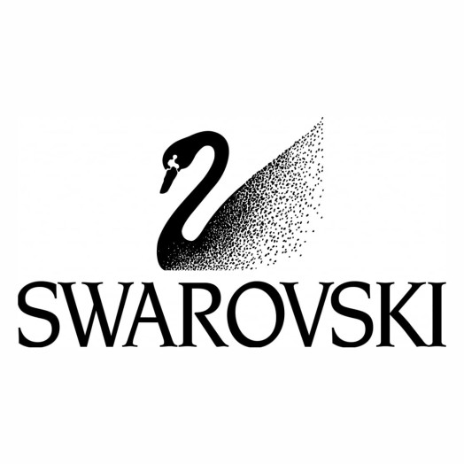 1989 - Логотип с лебедем. Непрерывно развиваясь, Swarovski представляет новый логотип — от драгоценного цветка к элегантной птице, лебедю, вдохновленному венским художником Густавом Климтом и символизирующему чистоту и элегантность хрусталя