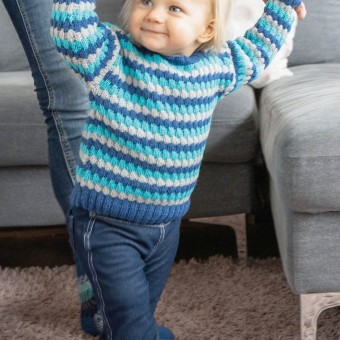 Модель 21083 детский свитер связан из пряжи Austermann Step 4 Merino 4-fach Uni & Melangen